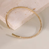 handcrafted in solid gold dainty diamond bangle