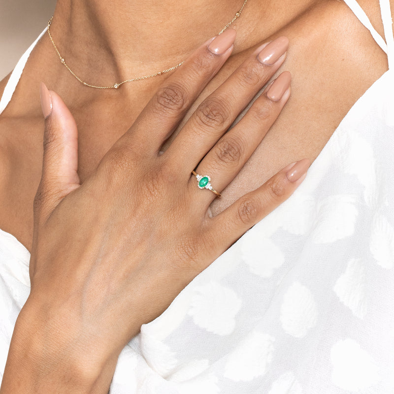 solid gold diamond ring with natural emerald 