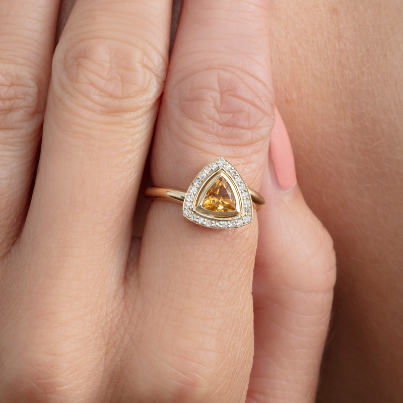 trilliant cut citrine engagement ring with white diamond halo 