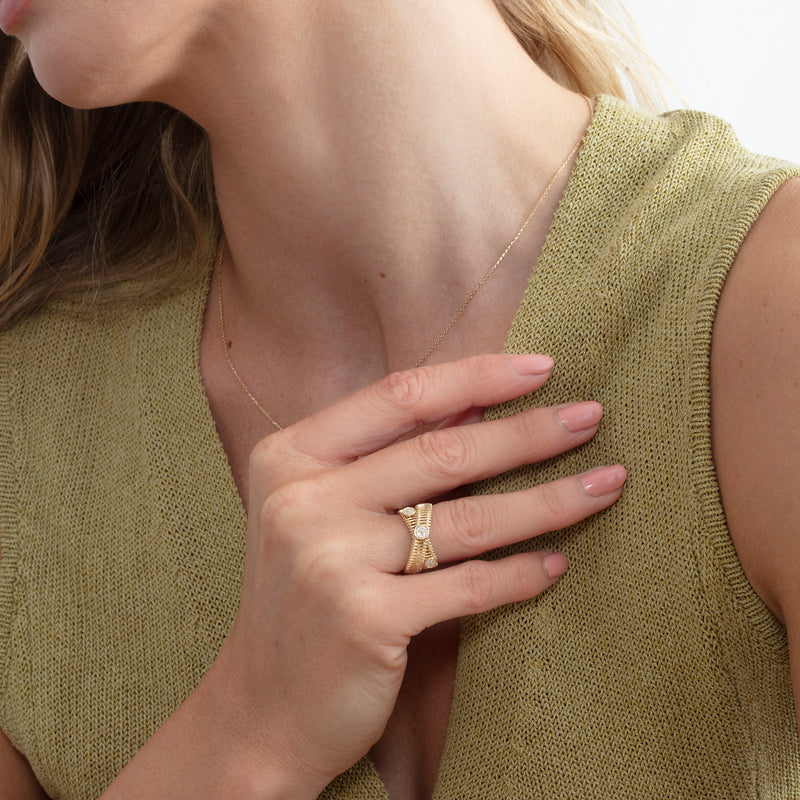 14k gold double band statement ring with ribbed texture and diamonds 