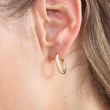 14k plain gold oval hoop huggie