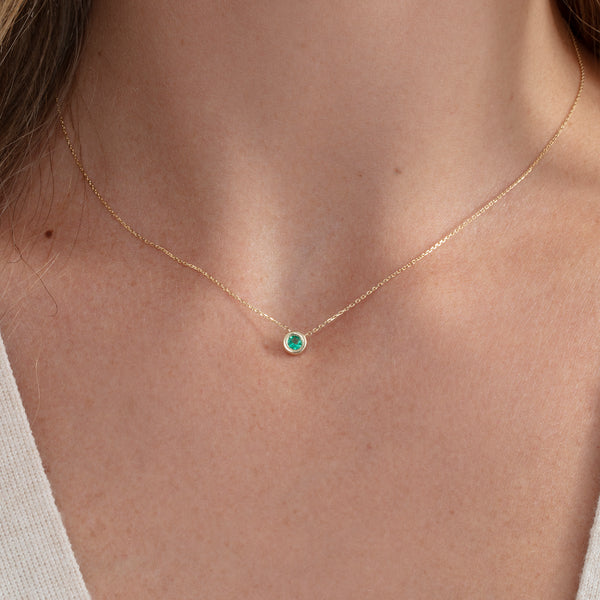 green emerald bezel necklace in 14k gold 