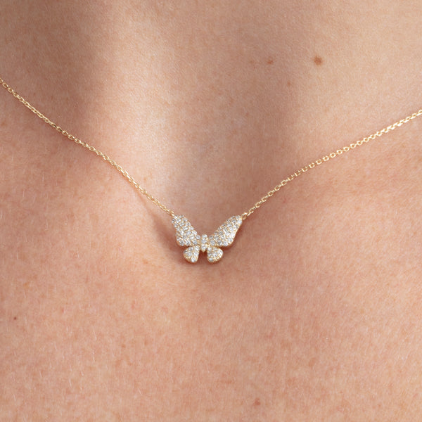 dainty diamond paved butterfly pendant handmade in 14k gold 