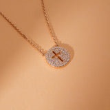 Luxurious diamond cross pendant with a cutout design in 14k gold