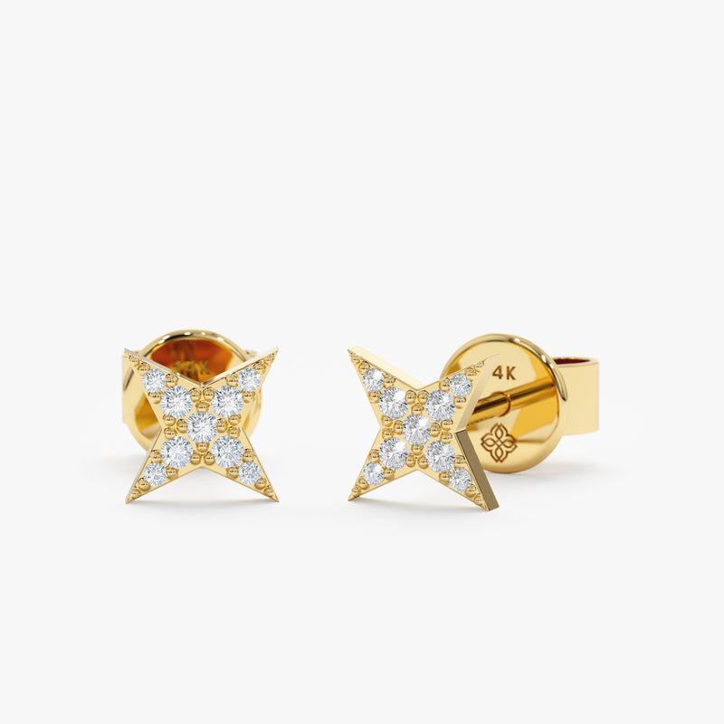 handmade pair of solid 14k gold in north star shape stud earrings with paved diamonds