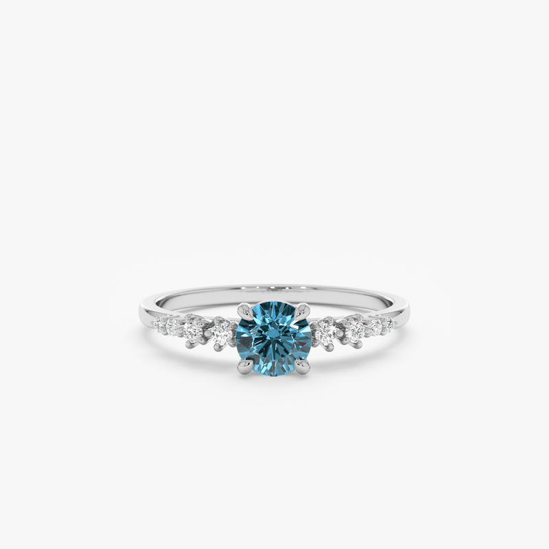 white gold engagement ring with london topaz and diamond