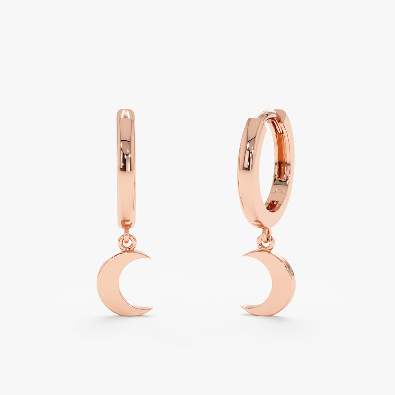 Pair of 14k solid rose gold crescent moon charm ear huggies.