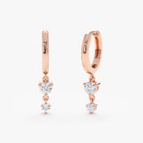 Pair of solid 14k rose gold double diamond hanging huggies 