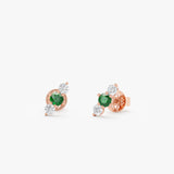 round emerald and diamond stud earrings in rose gold