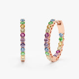 14k rose gold huggies with multicolor sapphire gemstones