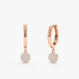 Pair of paved diamond disc charm huggie hoop earrings in 14k solid rose gold