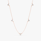 rose gold prong set diamond station necklace