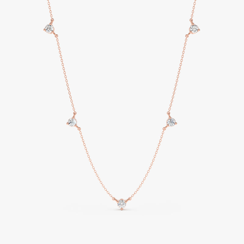 rose gold prong set diamond station necklace