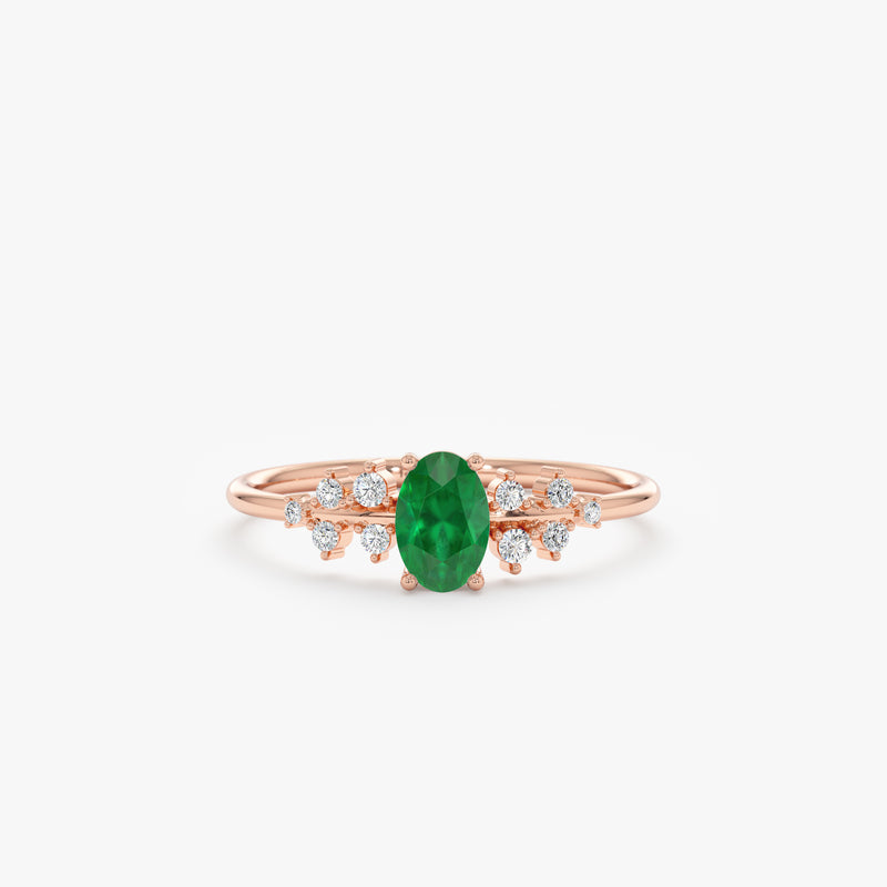 rose gold, oval emerald and round diamonds