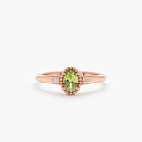 14k rose gold ring with peridot and two diamonds