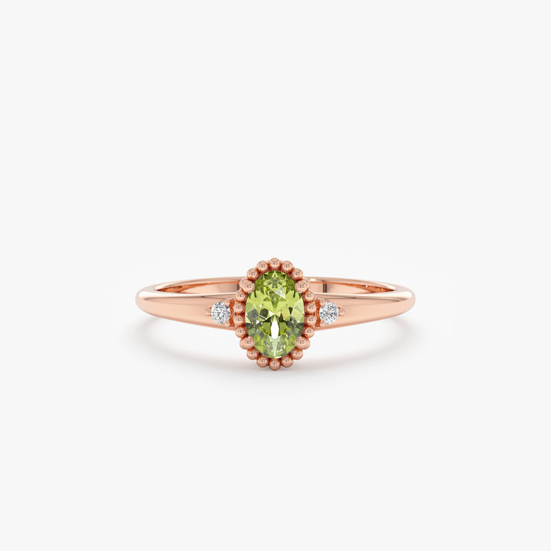 14k rose gold ring with peridot and two diamonds