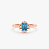 rose gold ring with natural blue zircon and white diamonds