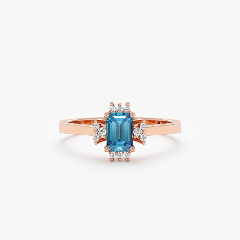 rose gold ring with natural blue zircon and white diamonds