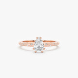 matte rose gold engagement ring with clear diamond