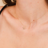 Solid gold star necklace with diamond