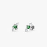 diamond emerald gold studs in white gold