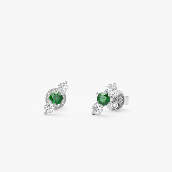 diamond emerald gold studs in white gold