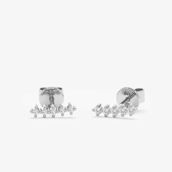 handcrafted pair of solid white gold multiple diamond ear crawler stud