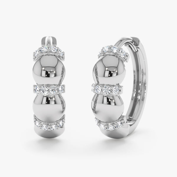 white gold round huggie earrings with natural diamonds