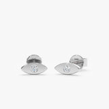 Pair of handmade solid 14k white gold eye stud earrings with single diamond