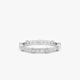 solid white gold ring with natural round white diamonds and baguette cut diamonds 