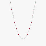 Elegant ruby necklace strung along a white gold chain.