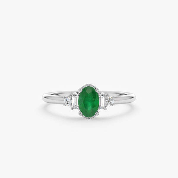 solid white gold oval cut emerald ring with white diamonds