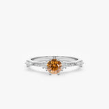 white gold engagement band with orange citrine gemstone