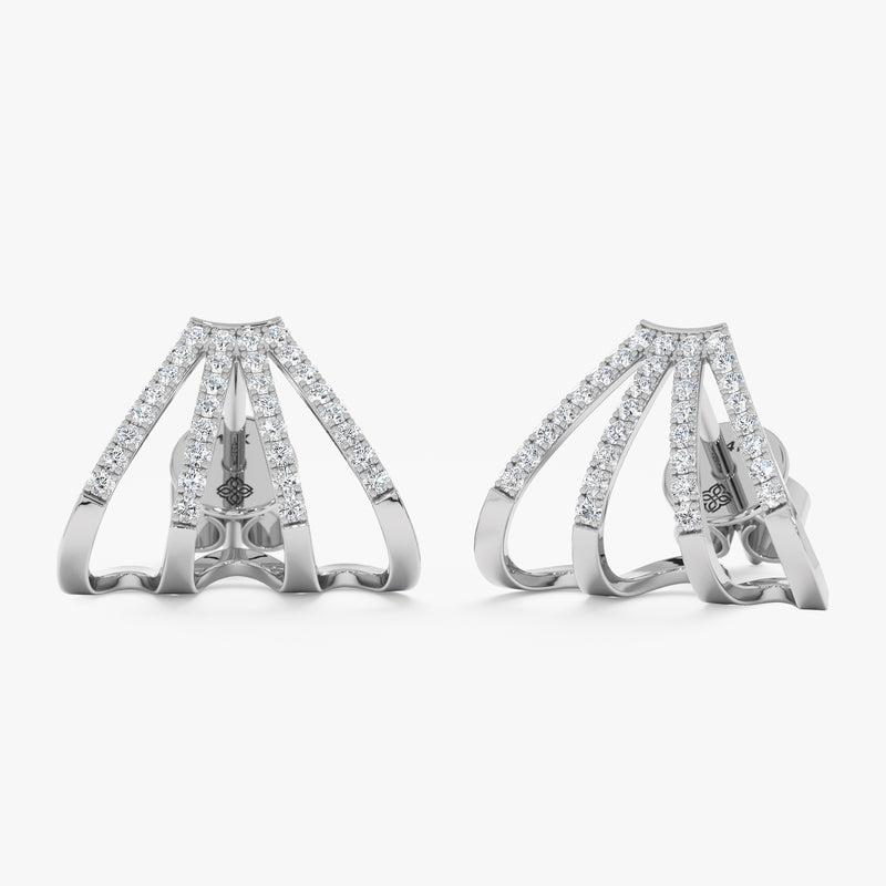 handcrafted pair of solid 14k white gold cage huggie studs with lined diamonds in arrow shape 