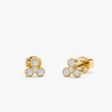 handmade solid 14k gold four diamond bezel stud earrings