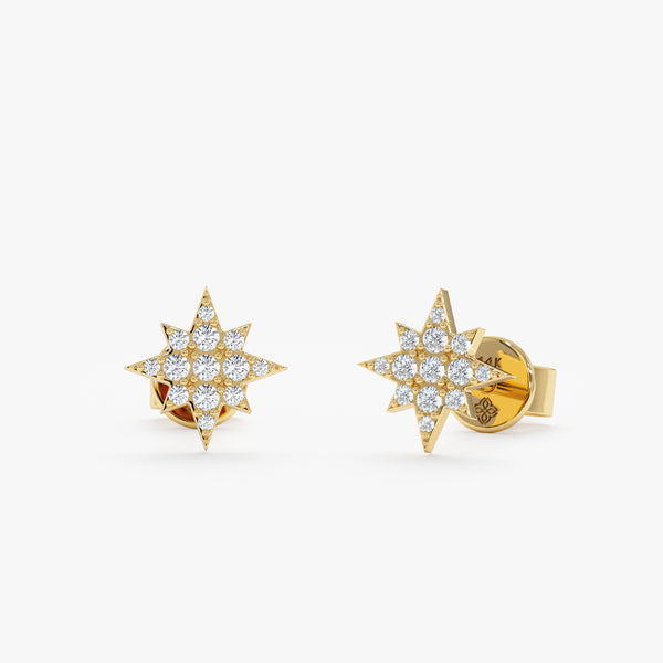 handmade pair of solid 14k gold starburst star stud earrings with paved diamonds