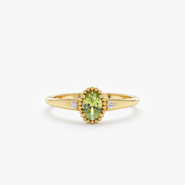 oval cut peridot engagement ring with diamond accents
