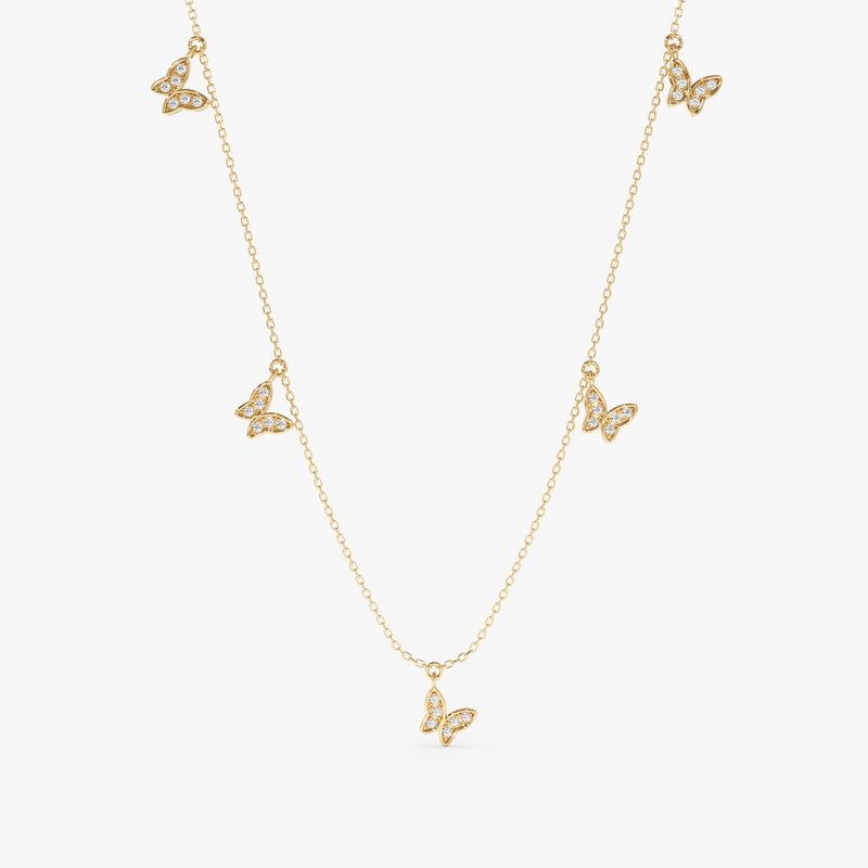 handcrafted solid gold necklace with hanging diamond butterfly charms