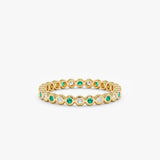 yellow gold emerald diamond bezel full eternity