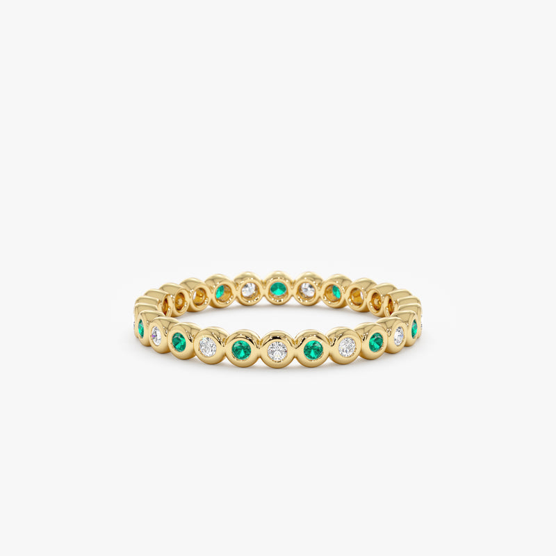 yellow gold emerald diamond bezel full eternity