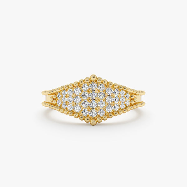 diamond paved shield ring in solid gold 