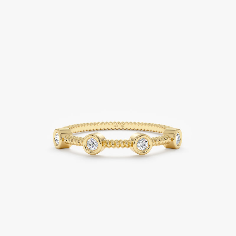 white diamond bezel station ring in solid gold 