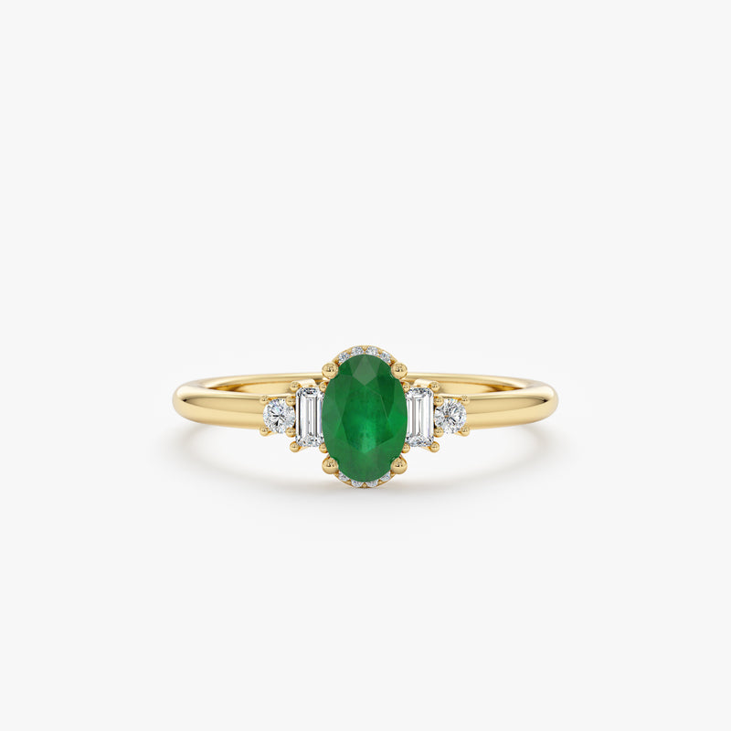 oval cut emerald ring with white diamond halo 