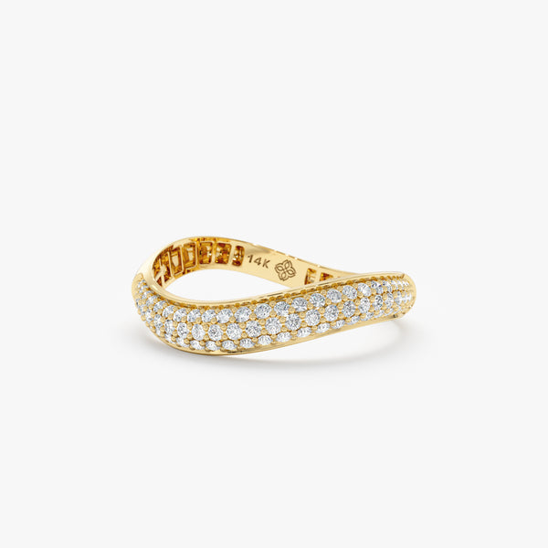 diamond paved curved ring in solid gold