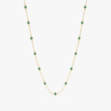 Emerald station necklace in gold