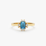 radiant cut blue zircon ring with surrounding white diamonds