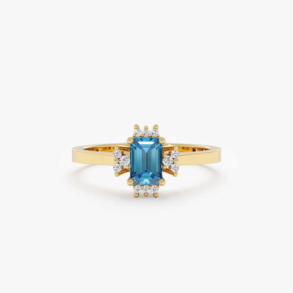 radiant cut blue zircon ring with surrounding white diamonds