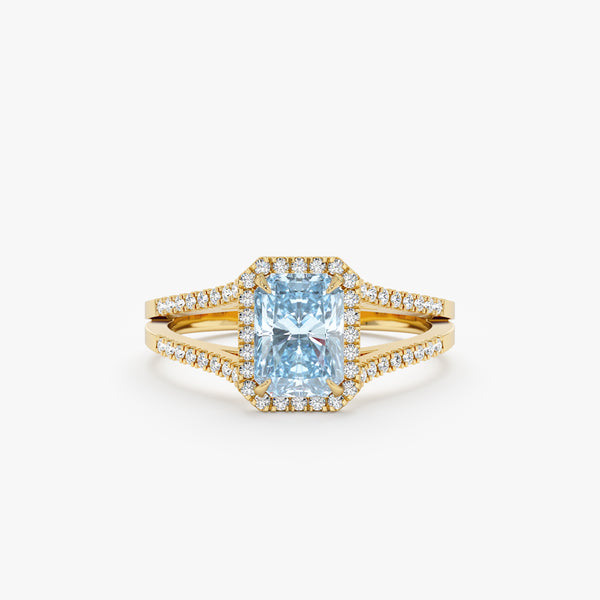 diamond framed aquamarine engagement band in yellow gold