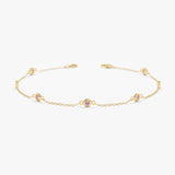 solid gold pink sapphire station bracelet