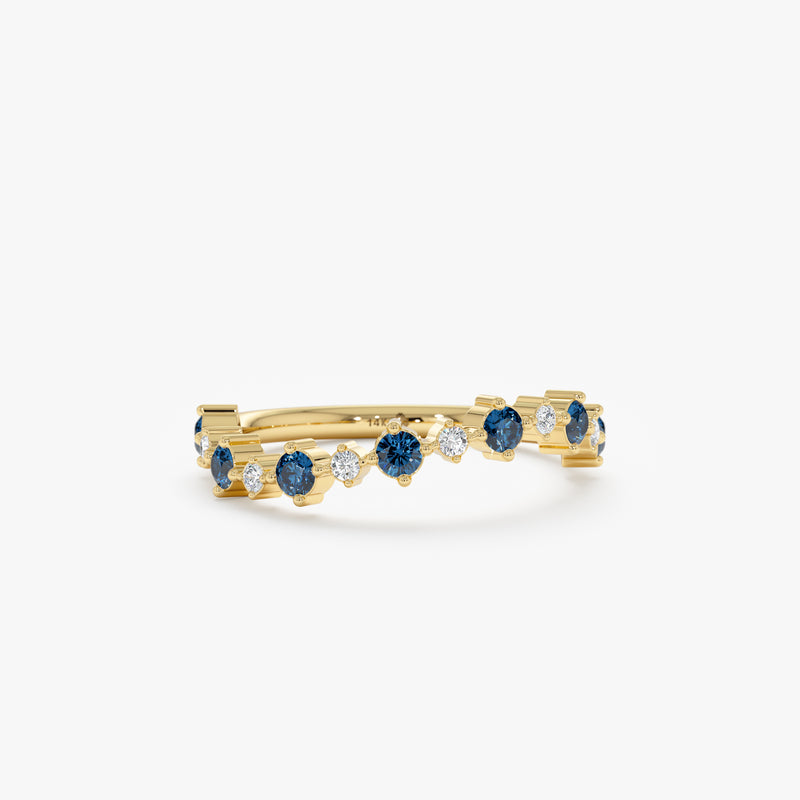 yellow gold diamond and blue topaz ring